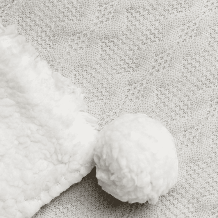 Grey Cable Knit Blanket with Plush Fleece and Pom Poms